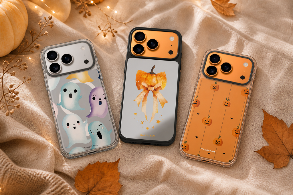 Three Hanogram iPhone 17 Pro Max Halloween cases featuring cute ghosts, a pumpkin bow and tiny pumpkins